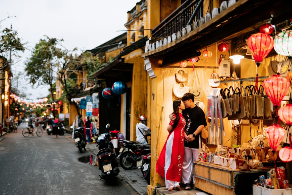 Exploring Hoi An through the lantern-lit streets of the Ancient Town as evening arrives in Vietnam.